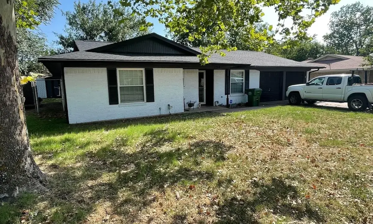 Professional roofing crew working on a residential roof in Union Mill